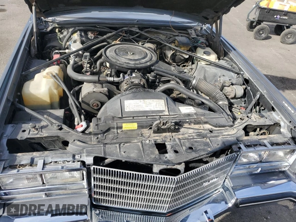 1985 Cadillac Eldorado z VIN 1G6EL5786FE628861, wystawiony jako Copart lot #76372384 z przebiegiem 15 146 mil mil oraz Szkody całkowita. Historia ofert i sprzedaży dostępna na DreamBid. Obrazek 13.