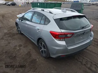 2023 Subaru Impreza Premium with VIN 4S3GTAV6XP3703123, listed as a IAAI auction lot 42018724 with 80,610 mi miles and . Bid and sale history available at DreamBid. Image 3.