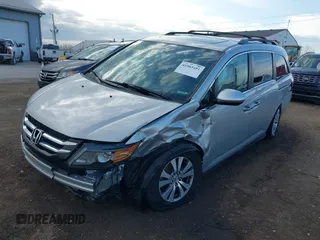 2014 Honda Odyssey EX-L with VIN 5FNRL5H65EB096544, listed as a IAAI auction lot 41903451 with 99,628 mi miles and . Bid and sale history available at carsss.com. Image 6.