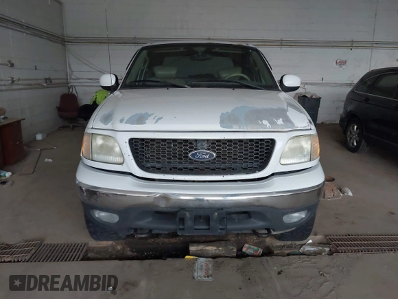 2003 Ford F-150 XLT with VIN 1FTRW08L03KB51627, listed as a IAAI auction lot 42497227 with 330,207 mi miles and . Bid and sale history available at DreamBid. Image 12.
