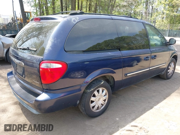 2005 Chrysler Town & Country Touring with VIN 2C8GP54L95R181669, listed as a IAAI auction lot 42065243 with 183,285 mi miles. Bid and sale history available at carsss.com. Image 4.