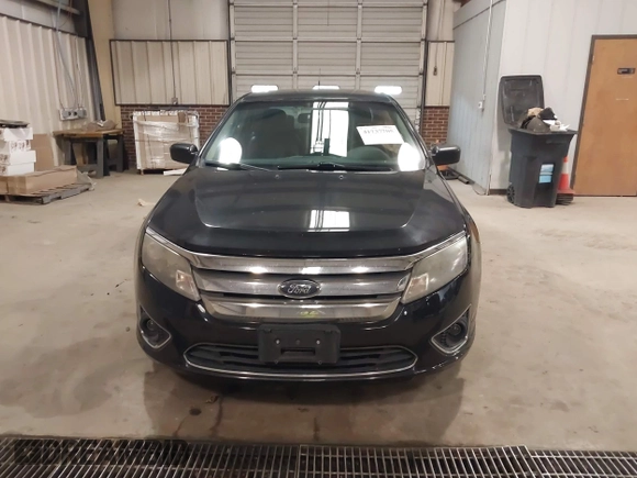 2010 Ford Fusion Hybrid with VIN 3FADP0L39AR140087, listed as a IAAI auction lot 41737705 with 118,563 mi miles. Bid and sale history available at carsss.com. Image 12.