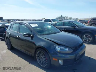 2014 Volkswagen GTI Driver's Edition with VIN WVWHD7AJ8EW003725, listed as a IAAI auction lot 41772639 with 131,500 mi miles. Bid and sale history available at carsss.com. Image 1.