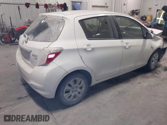 2013 Toyota Yaris L with VIN JTDKTUD33DD566664, listed as a IAAI auction lot 41524571 with 148,050 mi miles and . Bid and sale history available at DreamBid. Image 4.