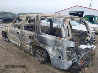 2005 Cadillac Escalade z VIN 1GYEC63N45R217863, wystawiony jako IAAI lot #41913229 z przebiegiem Nie podano mil oraz . Historia ofert i sprzedaży dostępna na DreamBid. Obrazek 3.