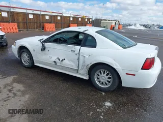 2000 Ford Mustang z VIN 1FAFP4049YF296568, wystawiony jako IAAI lot #41598325 z przebiegiem 144 186 mil mil oraz . Historia ofert i sprzedaży dostępna na DreamBid. Obrazek 3.