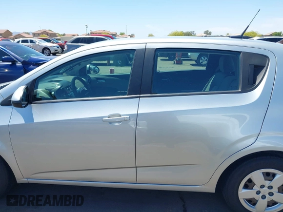 2014 Chevrolet Sonic LS with VIN 1G1JA6SH1E4135729, listed as a IAAI auction lot 42169273 with 74,969 mi miles and . Bid and sale history available at DreamBid. Image 14.