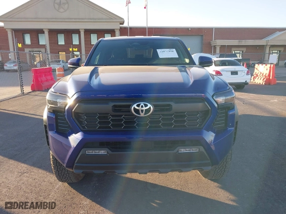 2024 Toyota Tacoma 4WD SR5 with VIN 3TYLB5JN3RT028338, listed as a IAAI auction lot 41870958 with 2,249 mi miles. Bid and sale history available at carsss.com. Image 12.