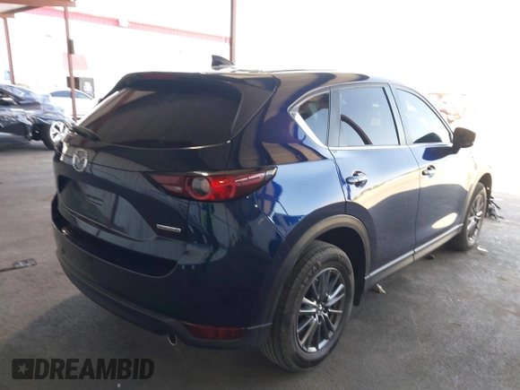2020 Mazda CX-5 Touring z VIN JM3KFACM2L0802461, wystawiony jako IAAI lot #42148039 z przebiegiem 57 963 mil mil oraz . Historia ofert i sprzedaży dostępna na DreamBid. Obrazek 4.