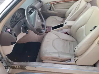 1999 Mercedes-Benz SL-Class with VIN WDBFA68F8XF178084, listed as a Copart auction lot 82295024 with 123,008 mi miles and Salvage Title. Bid and sale history available at carsss.com. Image 7.