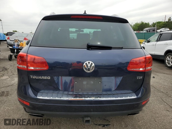 2011 Volkswagen Touareg Lux z VIN WVGFK9BP4BD001551, wystawiony jako Copart lot #58743065 z przebiegiem 142 661 mil mil oraz Szkoda całkowita • Salvage title. Historia ofert i sprzedaży dostępna na DreamBid. Obrazek 6.