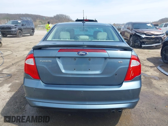 2012 Ford Fusion SE z VIN 3FAHP0HA7CR424958, wystawiony jako IAAI lot #41922636 z przebiegiem 101 149 mil mil oraz . Historia ofert i sprzedaży dostępna na DreamBid. Obrazek 17.