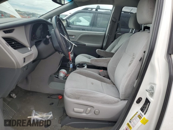 2015 Toyota Sienna LE AAS with VIN 5TDKK3DC2FS661818, listed as a Copart auction lot 64165795 with 171,702 mi miles and Clean title. Bid and sale history available at DreamBid. Image 7.