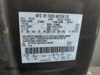 2006 Ford F-150 XLT with VIN 1FTPX14576NA19050, listed as a Copart auction lot 77426344 with 191,587 mi miles and Salvage title. Bid and sale history available at DreamBid. Image 14.