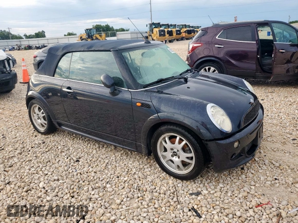 2005 MINI Convertible with VIN WMWRF33485TF61638, listed as a Copart auction lot 59822125 with 89,011 mi miles and Clean title. Bid and sale history available at DreamBid. Image 4.