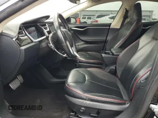 2014 Tesla Model S 60 with VIN 5YJSA1H11EFP36611, listed as a Copart auction lot 59544085 with 97,214 mi miles and Salvage title. Bid and sale history available at DreamBid. Image 7.