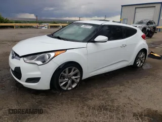 2016 Hyundai Veloster z VIN KMHTC6AD5GU266122, wystawiony jako Copart lot #55153085 z przebiegiem 100 068 mil mil oraz Tytuł czysty. Historia ofert i sprzedaży dostępna na DreamBid. Obrazek 1.