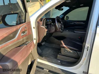 2022 Cadillac Escalade Premium Luxury Platinum with VIN 1GYS4DKL2NR201150, listed as a Copart auction lot 77114414 with 24,719 mi miles and Clean Title. Bid and sale history available at carsss.com. Image 9.