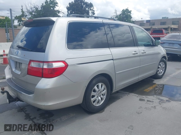 2007 Honda Odyssey EX-L with VIN 5FNRL38737B400745, listed as a IAAI auction lot 42211377 with 96,543 mi miles and . Bid and sale history available at DreamBid. Image 4.
