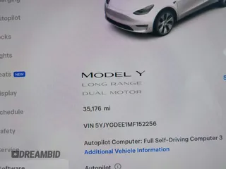 2021 Tesla Model Y Long Range with VIN 5YJYGDEE1MF152256, listed as a IAAI auction lot 42004769 with 35,176 mi miles. Bid and sale history available at carsss.com. Image 7.