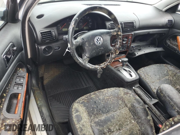 1999 Volkswagen Passat GL z VIN WVWMD63B1XE216281, wystawiony jako Copart lot #75200694 z przebiegiem Nie podano mil oraz Nie do naprawy • Non repairable. Historia ofert i sprzedaży dostępna na DreamBid. Obrazek 8.