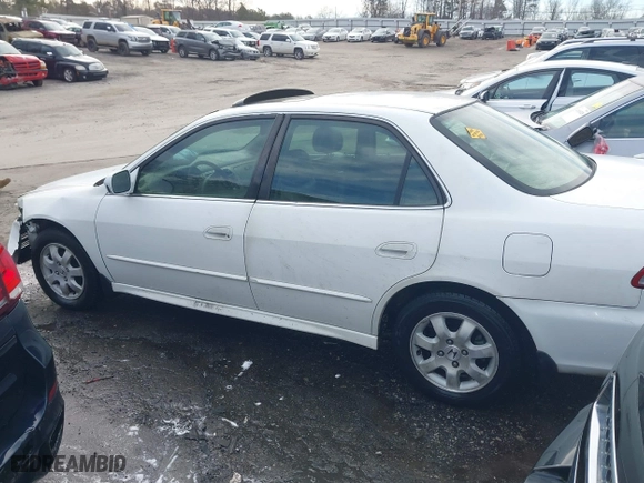 2002 Honda Accord Sdn EX with VIN JHMCG56632C004934, listed as a IAAI auction lot 41595113 with 298,868 mi miles. Bid and sale history available at carsss.com. Image 14.