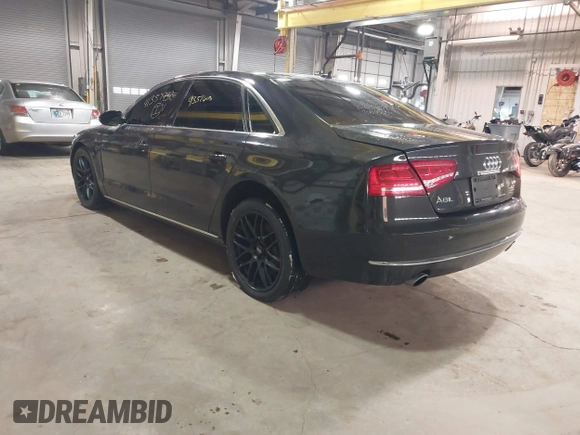 2012 Audi A8 z VIN WAURVAFD6CN014546, wystawiony jako IAAI lot #41357932 z przebiegiem 93 516 mil mil oraz . Historia ofert i sprzedaży dostępna na DreamBid. Obrazek 3.