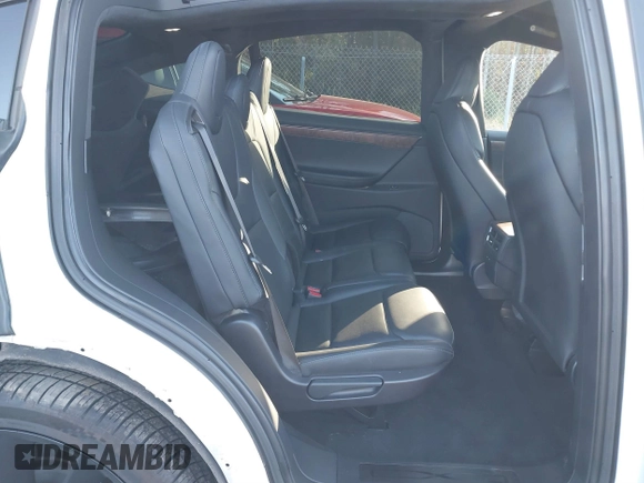 2020 Tesla Model X Long Range with VIN 5YJXCDE28LF298553, listed as a IAAI auction lot 40863184 with 54,031 mi miles and . Bid and sale history available at DreamBid. Image 8.