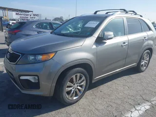2012 Kia Sorento SX with VIN 5XYKW4A23CG241547, listed as a IAAI auction lot 41939973 with 135,986 mi miles. Bid and sale history available at carsss.com. Image 2.