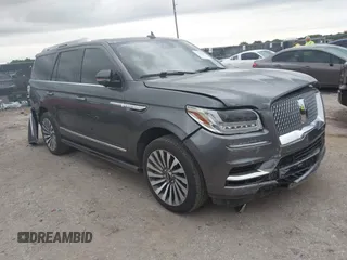 2021 Lincoln Navigator Reserve with VIN 5LMJJ2KT7MEL07459, listed as a IAAI auction lot 42351885 with 70,096 mi miles and . Bid and sale history available at DreamBid. Image 1.