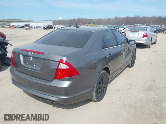2011 Ford Fusion SE with VIN 3FAHP0HA5BR183979, listed as a IAAI auction lot 42066401 with 205,154 mi miles. Bid and sale history available at carsss.com. Image 4.
