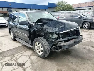 2003 GMC Envoy SLE z VIN 1GKDT13S432160651, wystawiony jako Copart lot #56938205 z przebiegiem 197 593 mil mil oraz Szkoda całkowita • Salvage title. Historia ofert i sprzedaży dostępna na DreamBid. Obrazek 14.