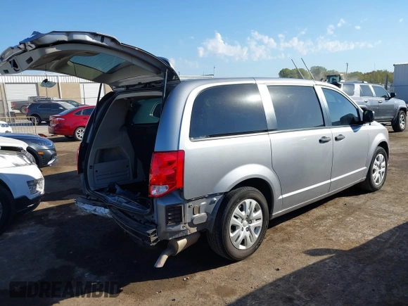 2020 Dodge Grand Caravan SE with VIN 2C4RDGBG9LR198425, listed as a IAAI auction lot 40672143 with 61,473 mi miles and . Bid and sale history available at DreamBid. Image 4.