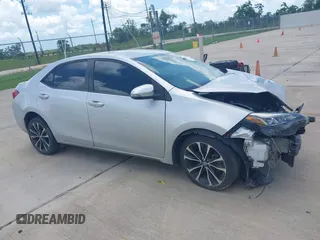 2017 Toyota Corolla L z VIN 5YFBURHE4HP732912, wystawiony jako IAAI lot #42451597 z przebiegiem 73 901 mil mil oraz . Historia ofert i sprzedaży dostępna na DreamBid. Obrazek 13.