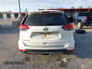 2017 Nissan Rogue SL with VIN JN8AT2MT0HW137951, listed as a IAAI auction lot 42017563 with 124,168 mi miles and . Bid and sale history available at DreamBid. Image 16.