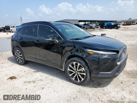2023 Toyota Corolla Cross XLE with VIN 7MUDAAAG2PV072301, listed as a Copart auction lot 63484815 with 25,017 mi miles and Salvage title. Bid and sale history available at DreamBid. Image 4.