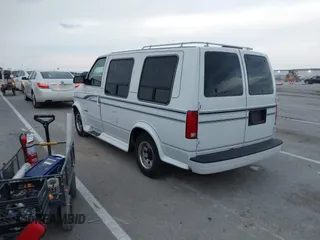 1995 Chevrolet Astro Cargo Van with VIN 1GBDM19W5SB172412, listed as a IAAI auction lot 41172353 with 119,531 mi miles. Bid and sale history available at carsss.com. Image 3.