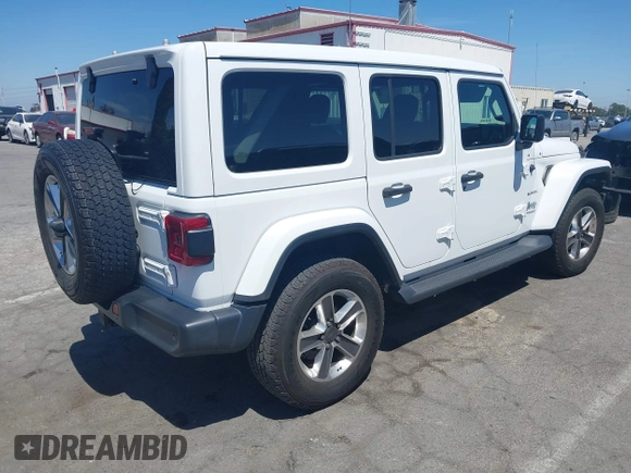 2019 Jeep Wrangler Unlimited Sahara with VIN 1C4HJXENXKW684942, listed as a IAAI auction lot 42021869 with 55,137 mi miles and . Bid and sale history available at DreamBid. Image 4.