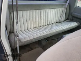 1994 GMC Sierra 1500 z VIN 2GTEK19K7R1531515, wystawiony jako Copart lot #45211685 z przebiegiem 286 840 mil mil oraz Szkoda całkowita • Salvage title. Historia ofert i sprzedaży dostępna na DreamBid. Obrazek 10.