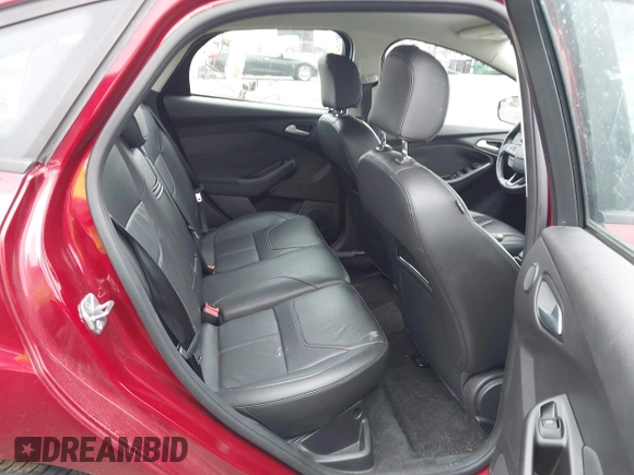2016 Ford Focus SE with VIN 1FADP3F24GL249455, listed as a IAAI auction lot 40421121 with 49,043 mi miles. Bid and sale history available at carsss.com. Image 8.