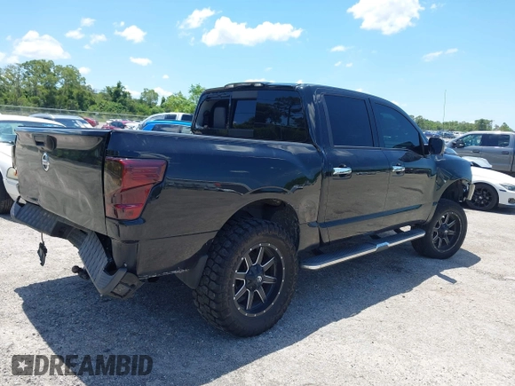 2018 Nissan Titan SV with VIN 1N6AA1E60JN511357, listed as a IAAI auction lot 42582405 with 110,043 mi miles and . Bid and sale history available at DreamBid. Image 4.