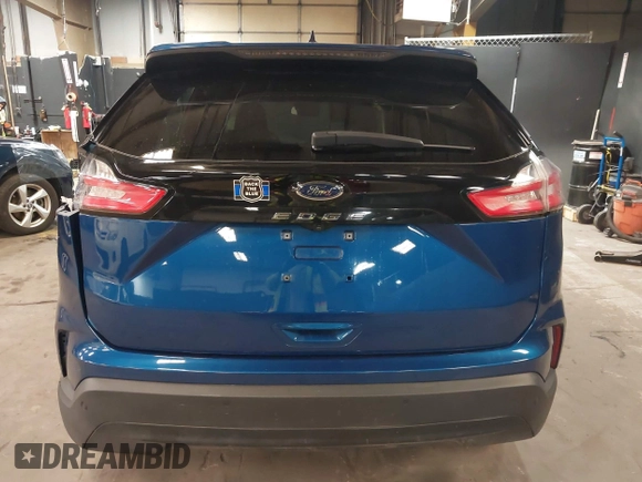 2021 Ford Edge SE z VIN 2FMPK3G94MBA28530, wystawiony jako IAAI lot #42027635 z przebiegiem 54 360 mil mil oraz . Historia ofert i sprzedaży dostępna na DreamBid. Obrazek 17.