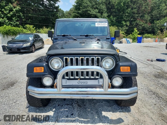 2001 Jeep Wrangler Sport с VIN 1J4FA49S91P347090, выставлен на аукционе Copart как лот 60436405 с пробегом 141 172 миль миль и Списание • Salvage title. История ставок и продаж доступна на DreamBid. Изображение 5.