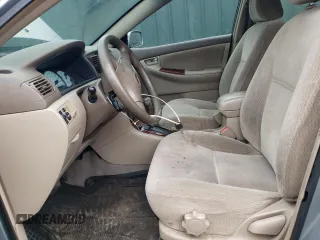 2003 Toyota Corolla CE with VIN 2T1BR32EX3C002101, listed as a Copart auction lot 51678735 with 168,201 mi miles and Salvage Title. Bid and sale history available at DreamBid. Image 7.