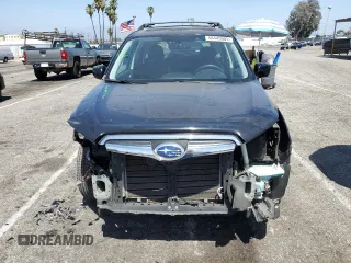 2014 Subaru Forester Premium with VIN JF2SJAEC0EH526895, listed as a Copart auction lot 58445005 with 131,186 mi miles and Salvage title. Bid and sale history available at DreamBid. Image 5.