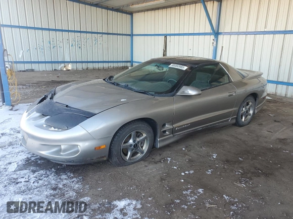 1999 Pontiac Firebird Firebird z VIN 2G2FS22K6X2225812, wystawiony jako Copart lot #88080985 z przebiegiem 149 684 mil mil oraz Czysty tytuł • Clean title. Historia ofert i sprzedaży dostępna na DreamBid. Obrazek 1.