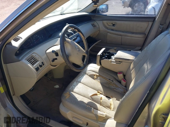 2004 Toyota Avalon XL with VIN 4T1BF28B74U343522, listed as a IAAI auction lot 41823601 with 146,181 mi miles and . Bid and sale history available at DreamBid. Image 5.