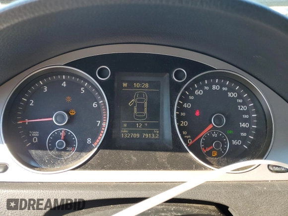 2009 Volkswagen Passat Komfort z VIN WVWJK73C79P056163, wystawiony jako Copart lot #42095525 z przebiegiem 132 709 mil mil oraz Szkoda całkowita • Salvage title. Historia ofert i sprzedaży dostępna na DreamBid. Obrazek 9.