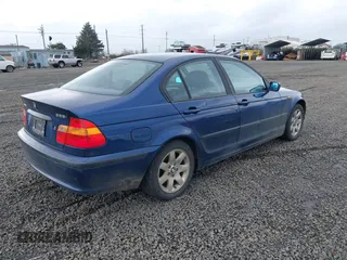 2004 BMW 3 Series 325i with VIN WBAET37414NH06040, listed as a IAAI auction lot 41793260 with 212,541 mi miles. Bid and sale history available at carsss.com. Image 4.