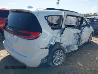 2022 Chrysler Pacifica Touring L with VIN 2C4RC1BGXNR132615, listed as a IAAI auction lot 41643983 with 45,717 mi miles and . Bid and sale history available at DreamBid. Image 4.